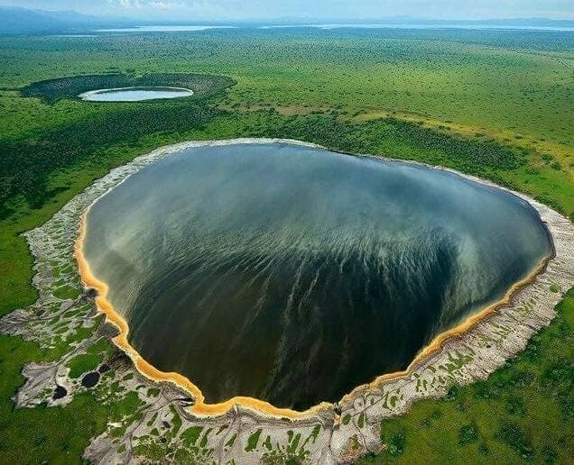 Aerial view of the Ngorongoro Crater, showing the caldera rim and floor